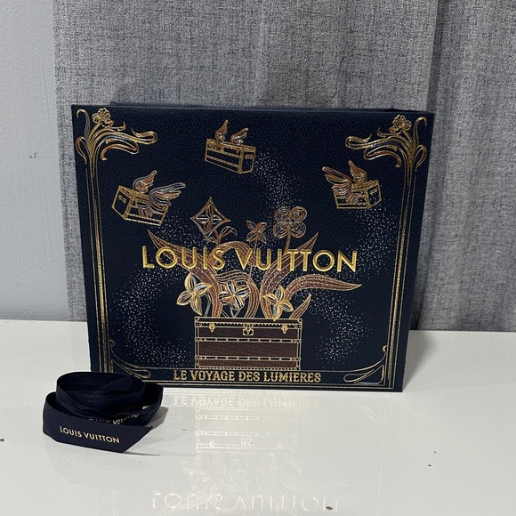 Louis Vuitton Other - Authentic empty Louis vuttion paper bag LE VOYAGE DES LUMIERES  with ribbon.